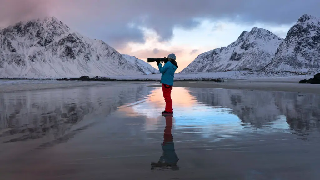 A photographer at work in Lofoten